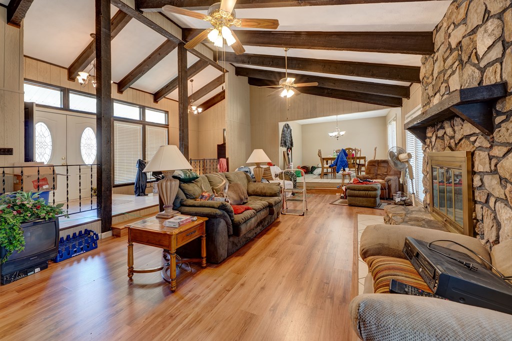 1676 Shoal Creek Road Dawsonville, GA 30534 - Photo 18 of 40 a living room with furniture