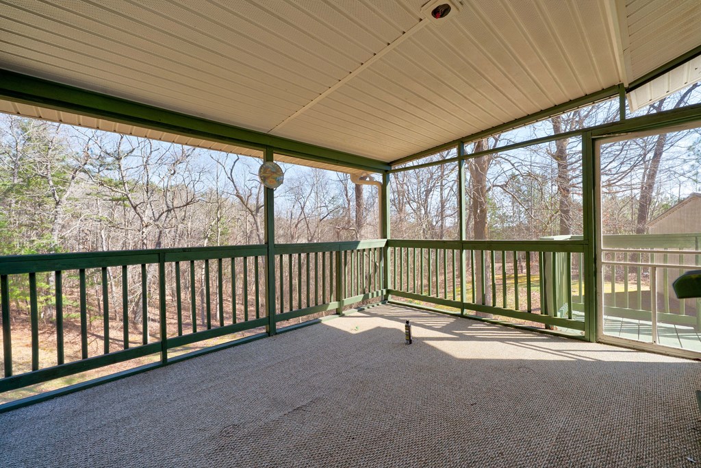 1676 Shoal Creek Road Dawsonville, GA 30534 - Photo 26 of 40 a view of a room with wooden walls