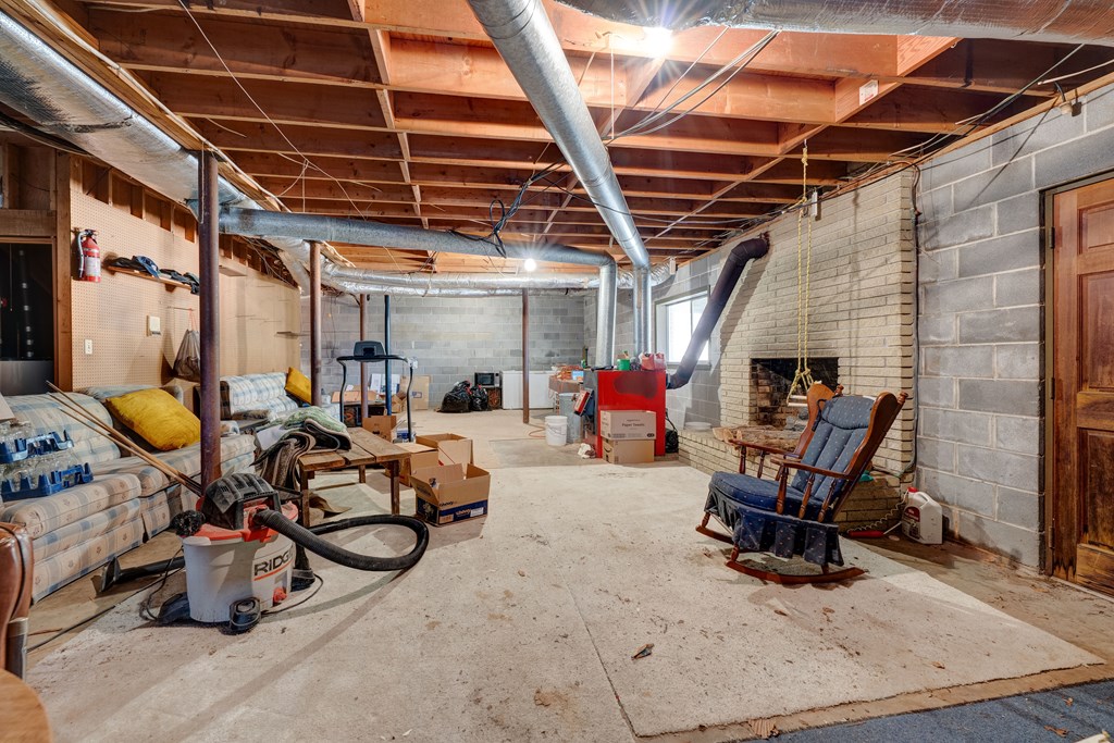 1676 Shoal Creek Road Dawsonville, GA 30534 - Photo 30 of 40 a view of a chairs in garage