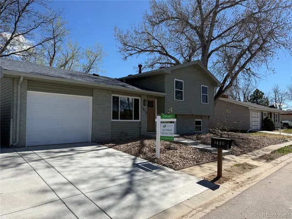 a front view of house with yard