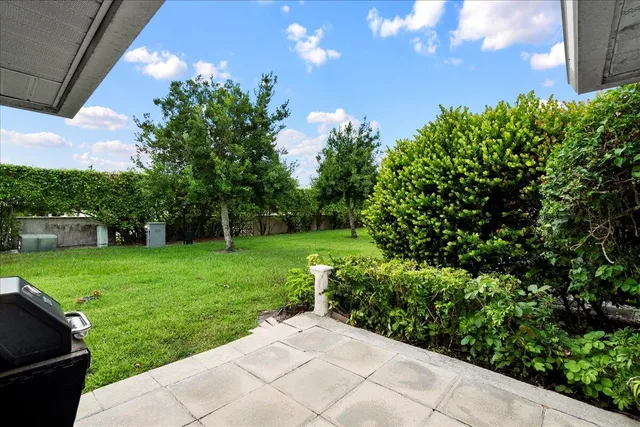 a view of a garden with a fountain
