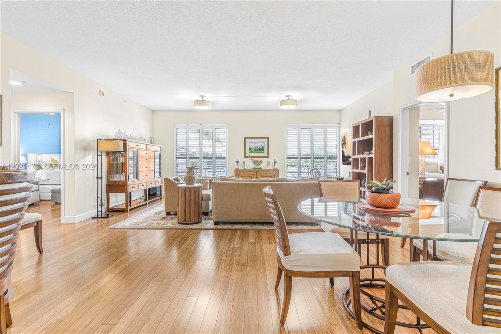 8395 Southwest 73rd Avenue, Unit 710 Miami, FL 33143 - Photo 1 of 32 a living room with stainless steel appliances kitchen island granite countertop furniture and a kitchen view