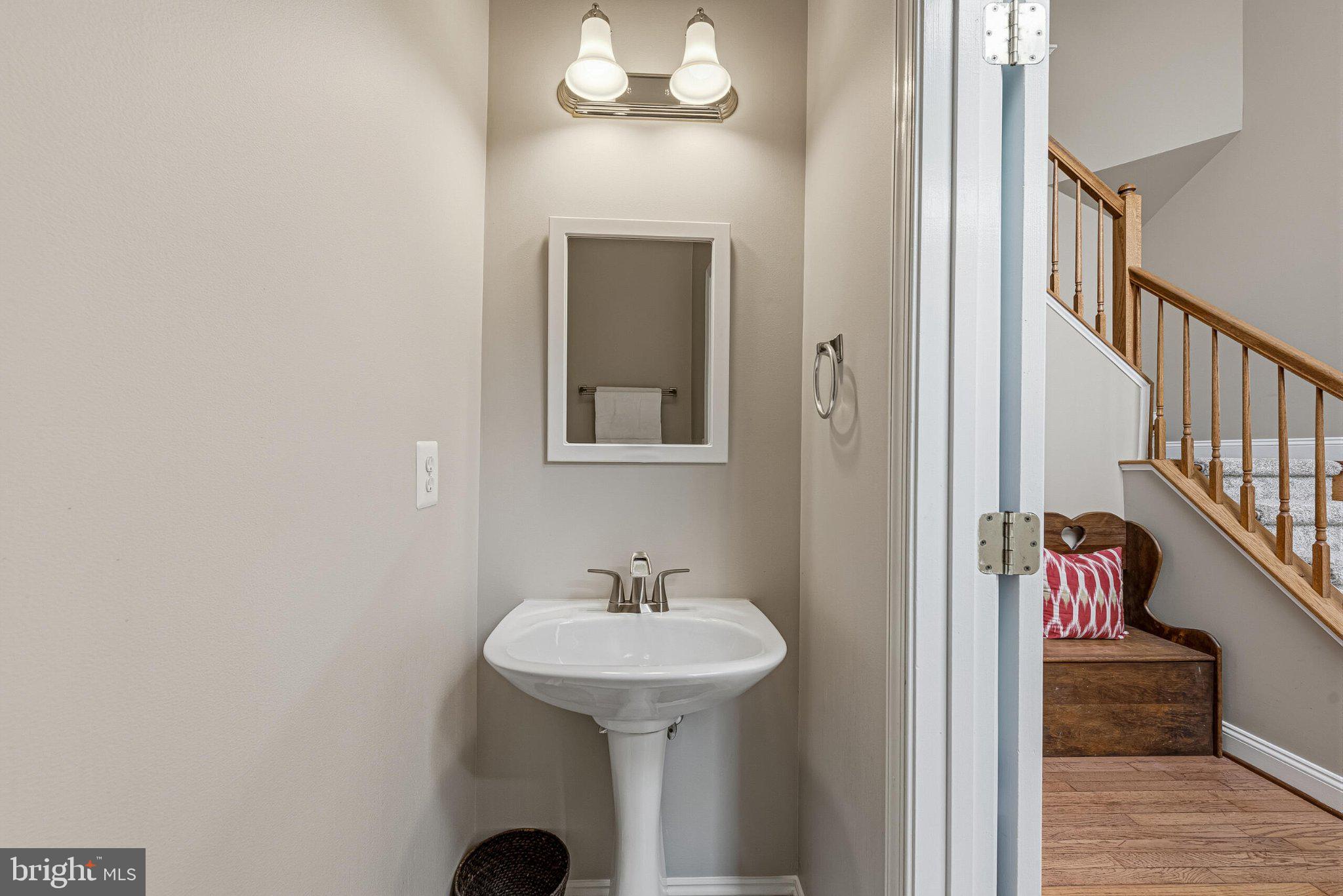 602 Shanks Evans Road Northeast Leesburg, VA 20176 - Photo 22 of 43 Charming half-bath with elegant fixtures.