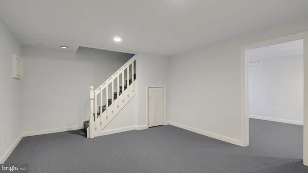 a view of an entryway with stairs