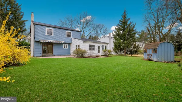 a view of backyard with green space
