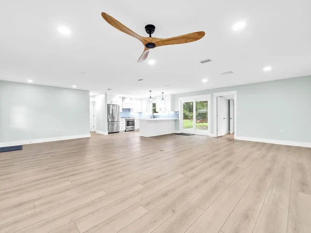 a view of a storage & utility room with a window