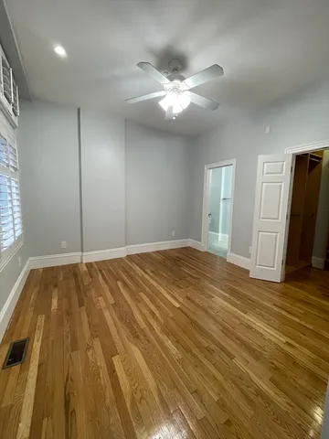 a view of a livingroom with wooden floor