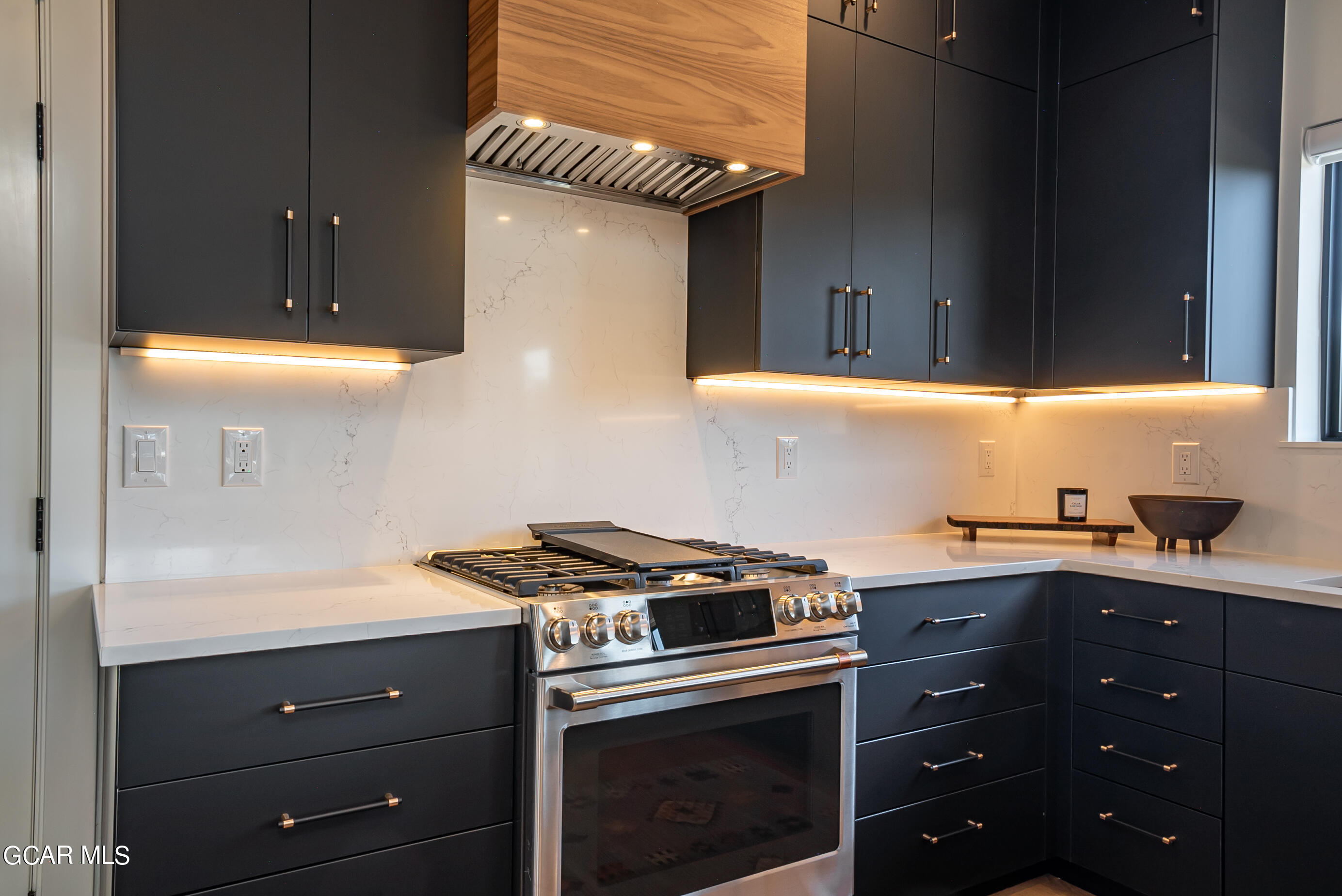 1066 Gcr 8 Tabernash, CO 80478 - Photo 11 of 46 a kitchen with a sink and cabinets
