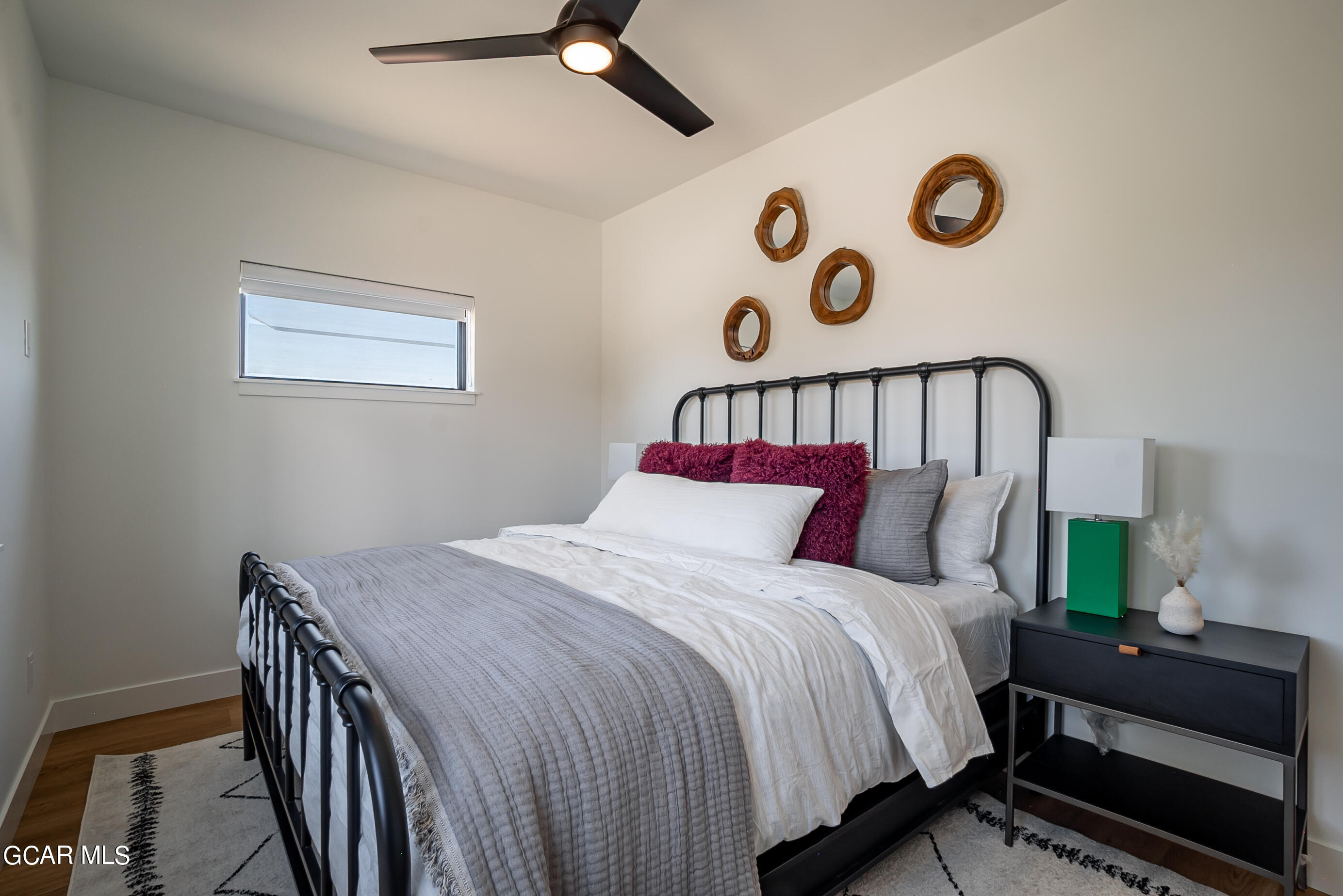 1066 Gcr 8 Tabernash, CO 80478 - Photo 21 of 46 a bedroom with bed and a window