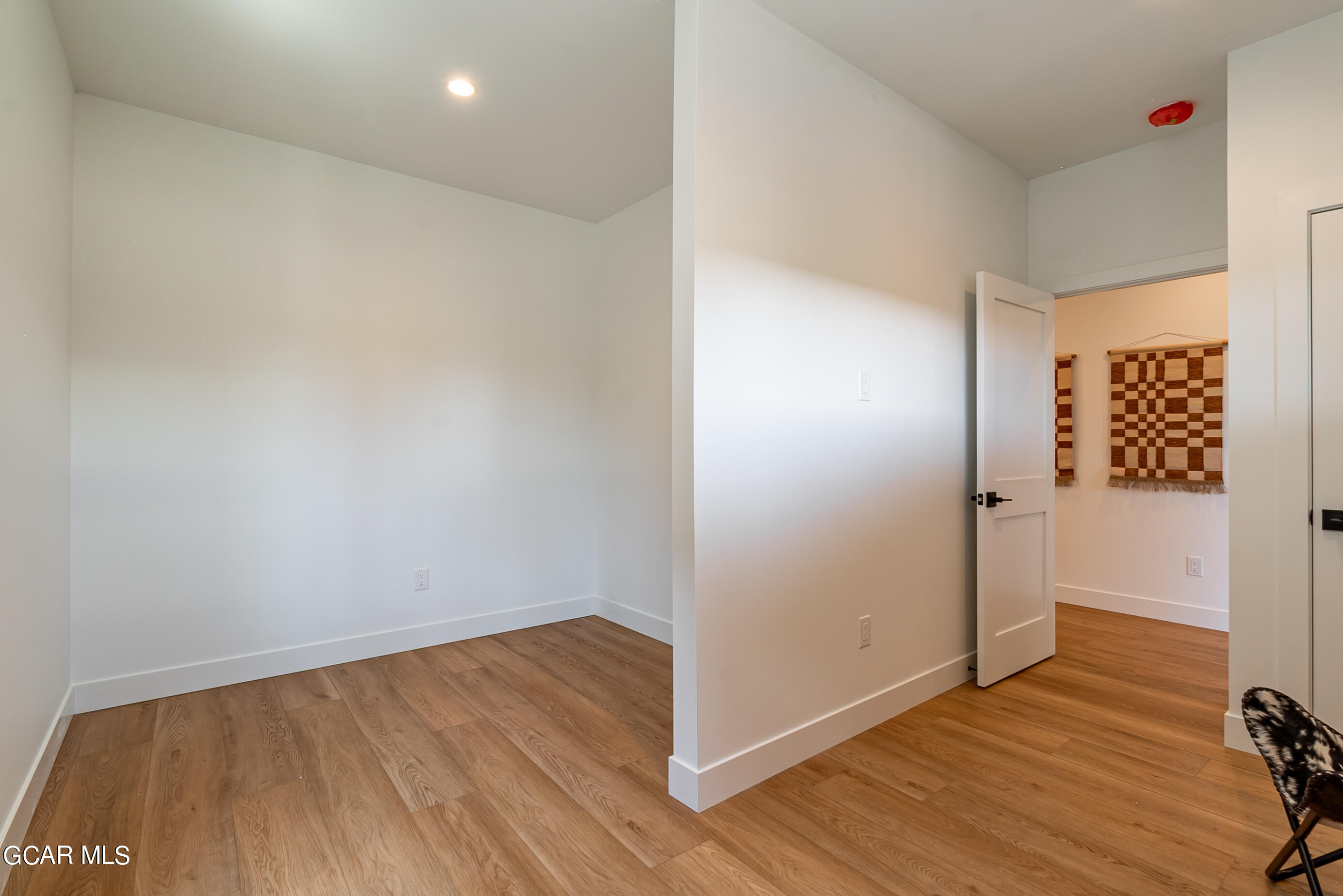 1066 Gcr 8 Tabernash, CO 80478 - Photo 27 of 46 wooden floor in an empty room