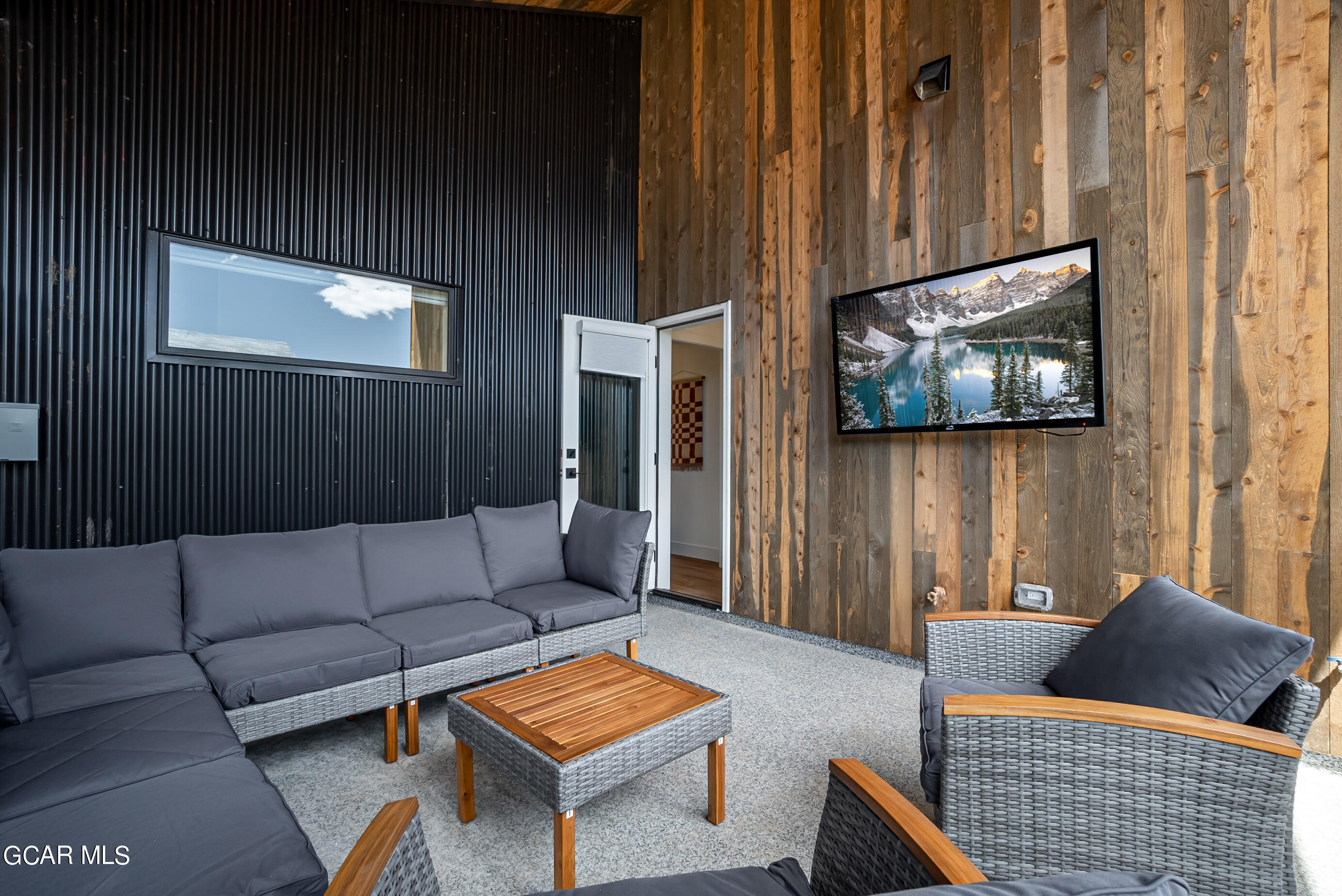 1066 Gcr 8 Tabernash, CO 80478 - Photo 31 of 46 a living room with furniture and a flat screen tv