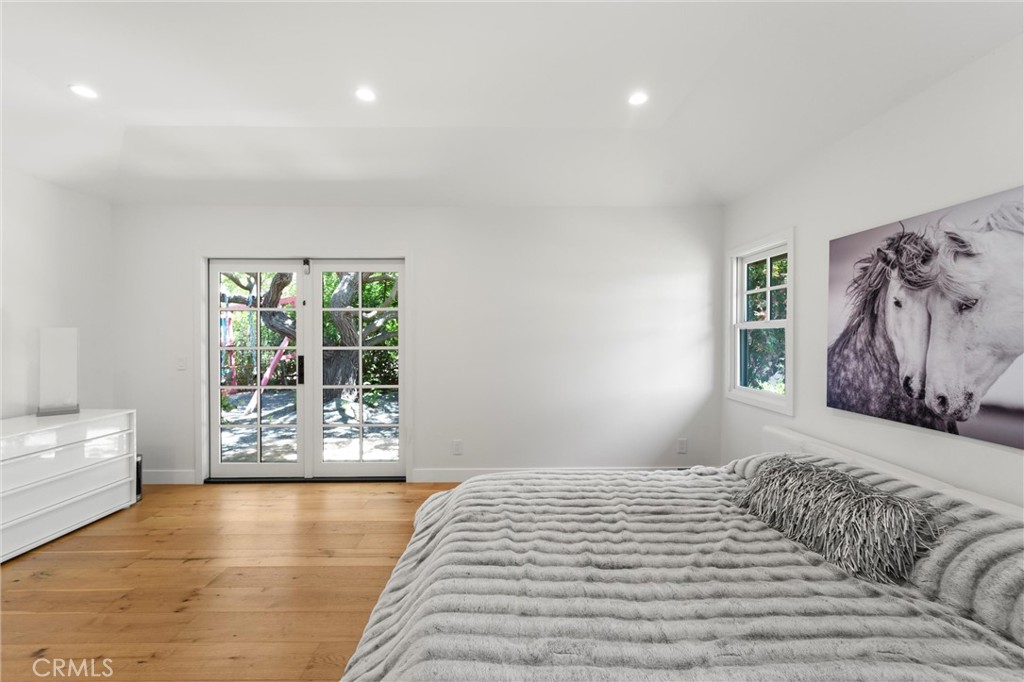 7337 La Soldadera Rancho Santa Fe, CA 92067 - Photo 32 of 60 a bedroom with a large bed and a window