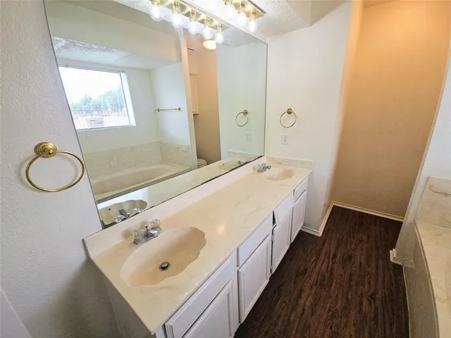 a bathroom with a sink and a tub