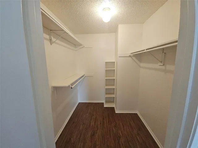 a bathroom with a toilet and a bathtub