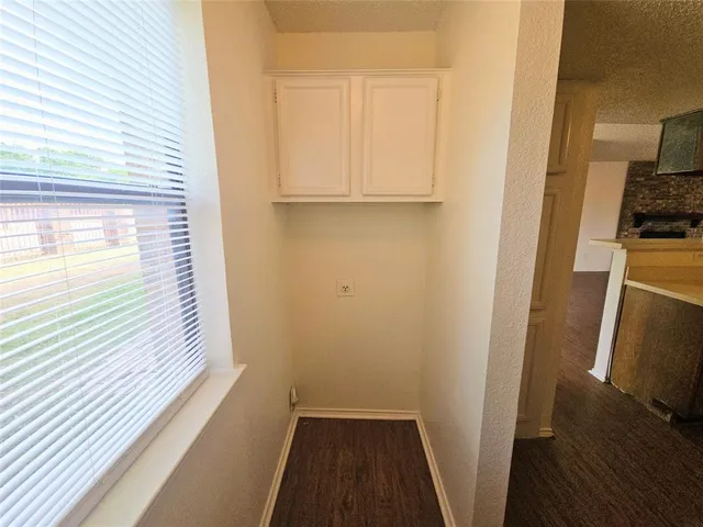 a bathroom with a sink a mirror and vanity