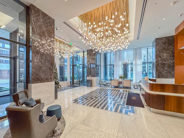 a view of spacious bedroom with furniture