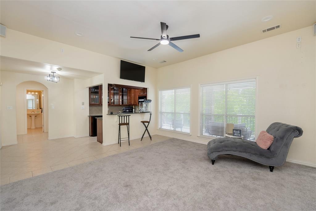 135 Kirkpatrick Road Ennis, TX 75119 - Photo 22 of 40 a living room with furniture and a large window