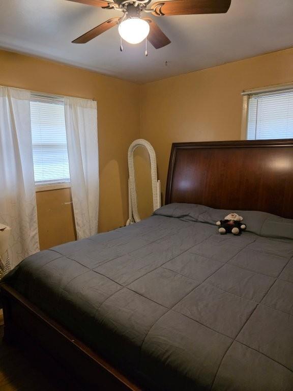 1882 Glen Echo Drive Decatur, GA 30032 - Photo 12 of 24 a bedroom with a bed and lamp