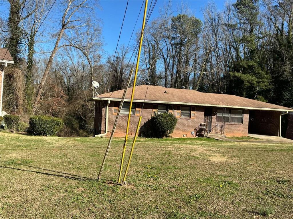 1882 Glen Echo Drive Decatur, GA 30032 - Photo 2 of 24 a view of a house with a yard