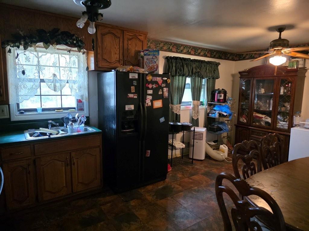 1882 Glen Echo Drive Decatur, GA 30032 - Photo 9 of 24 a kitchen with refrigerator and window