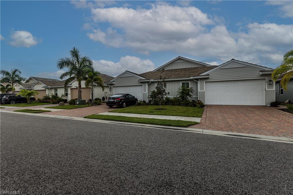 a view of house with outdoor space and street view
