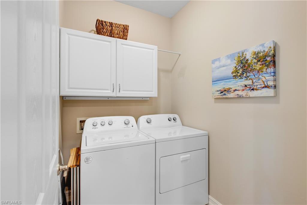 846 Enbrook Loop Naples, FL 34114 - Photo 14 of 45 a utility room with dryer and washer