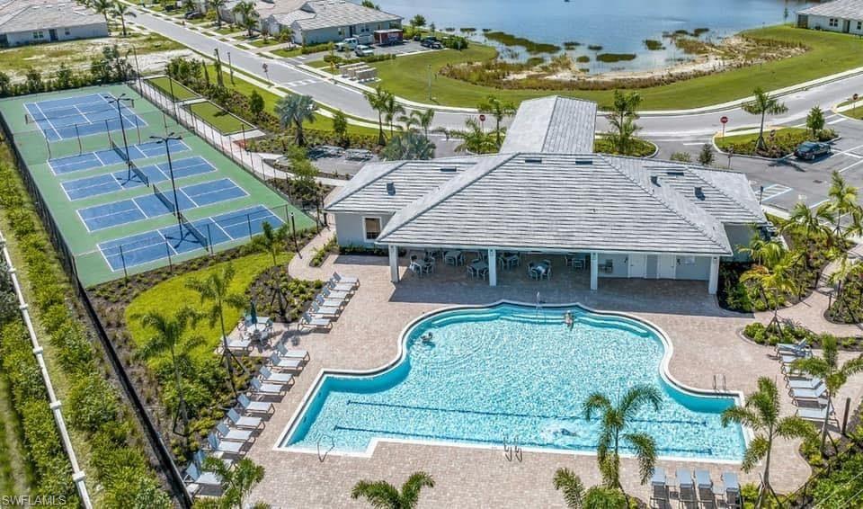 846 Enbrook Loop Naples, FL 34114 - Photo 22 of 45 an aerial view of a house with a garden