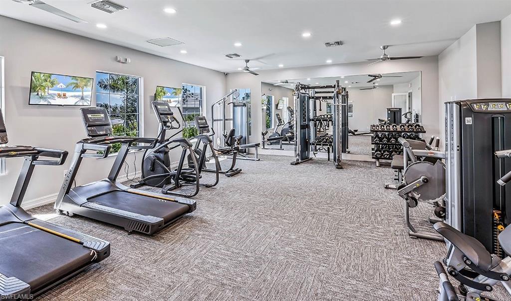 846 Enbrook Loop Naples, FL 34114 - Photo 24 of 45 a view of a room with gym equipment