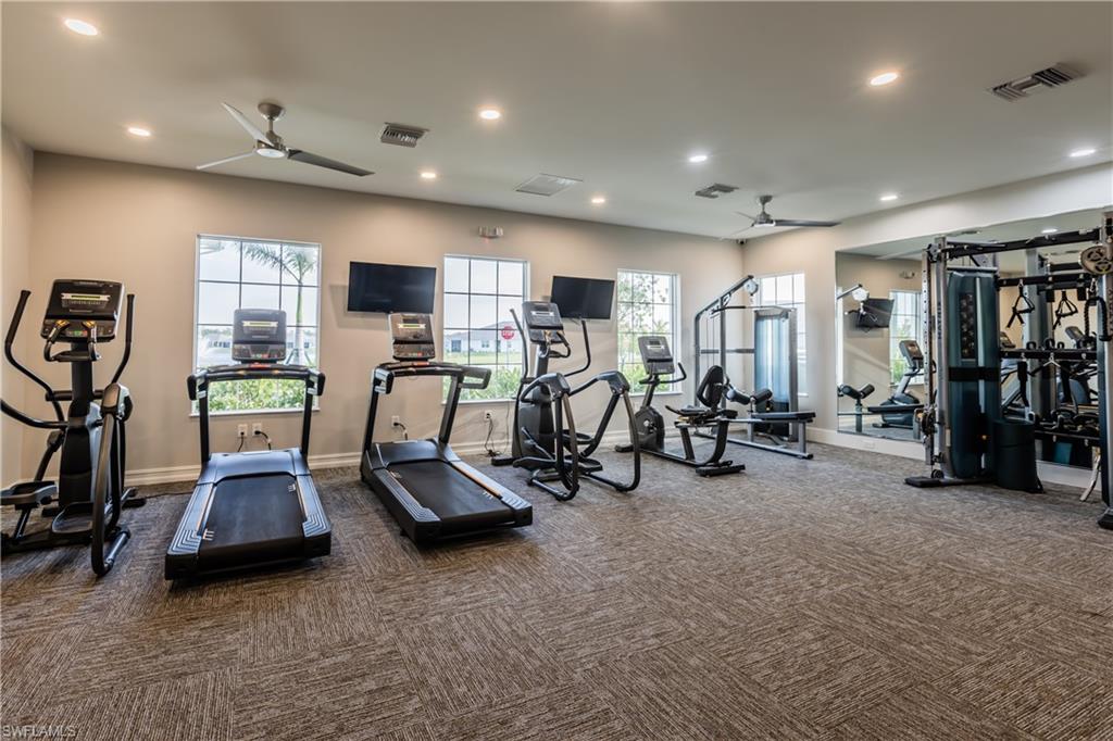 846 Enbrook Loop Naples, FL 34114 - Photo 25 of 45 a view of a room with gym equipment