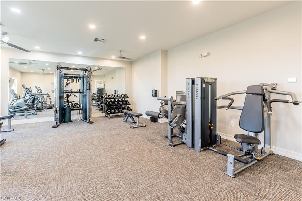 846 Enbrook Loop Naples, FL 34114 - Photo 26 of 45 a view of a room with gym equipment
