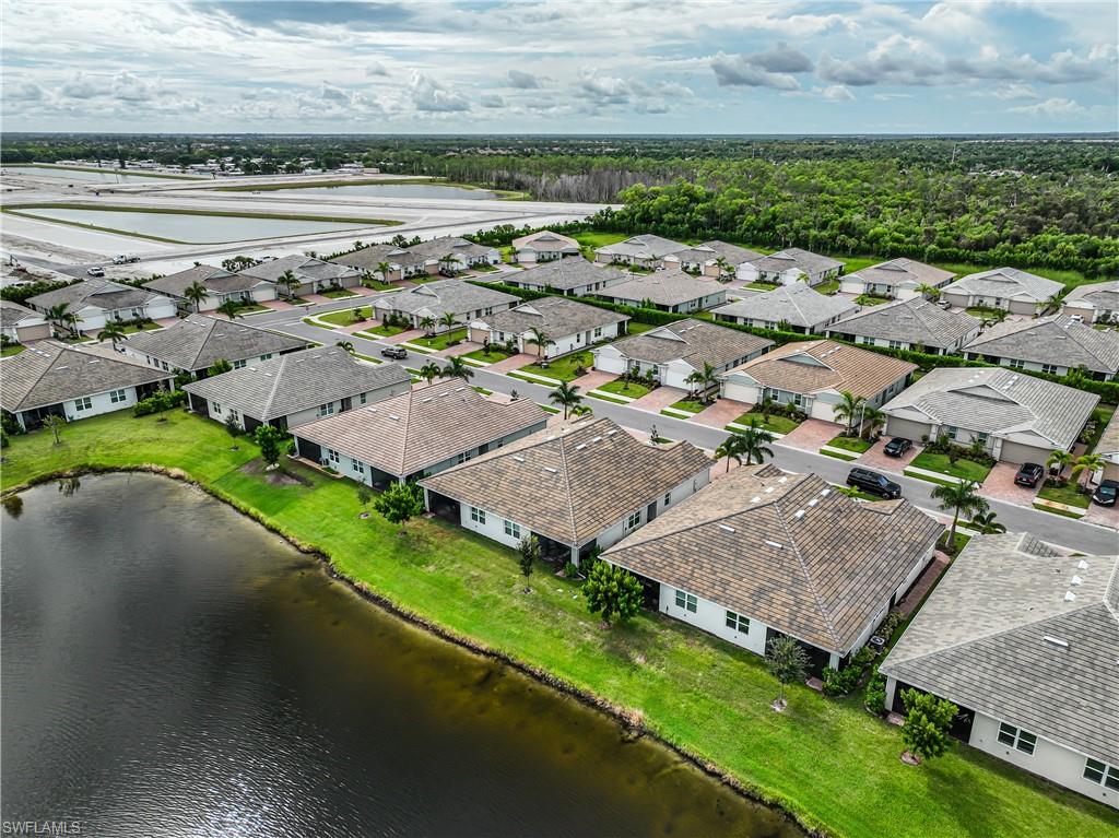 846 Enbrook Loop Naples, FL 34114 - Photo 38 of 45 an aerial view of a house with a garden