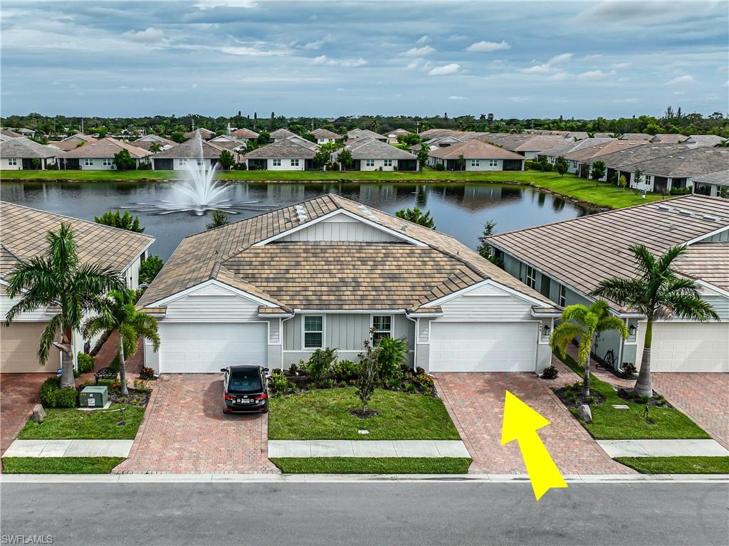846 Enbrook Loop Naples, FL 34114 - Photo 45 of 45 a aerial view of a house with swimming pool yard and outdoor seating