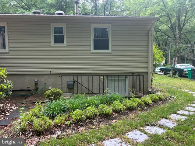 a view of a wooden house with a park