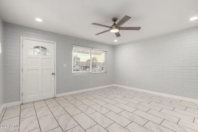 a view of an empty room and window