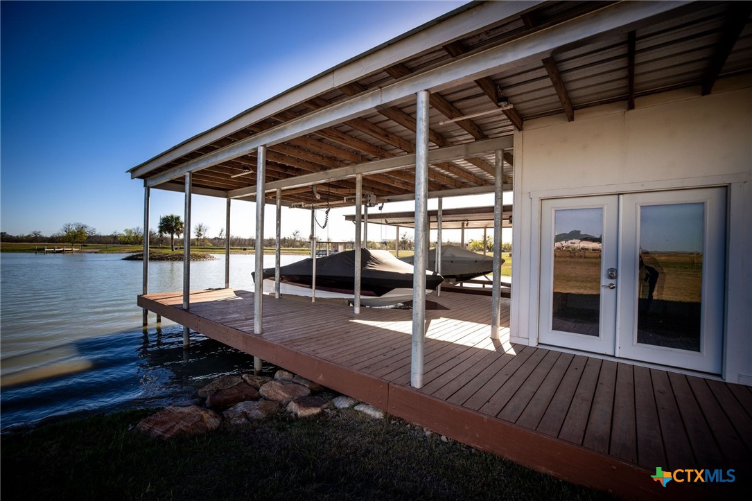 925 River Ranch Circle Martindale, TX 78655 - Photo 10 of 48 a view of a deck with wooden floor and outdoor seating