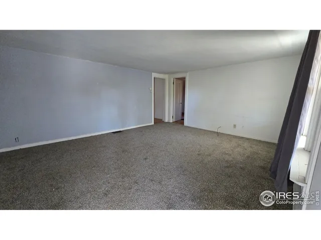 a black and white photo of a room