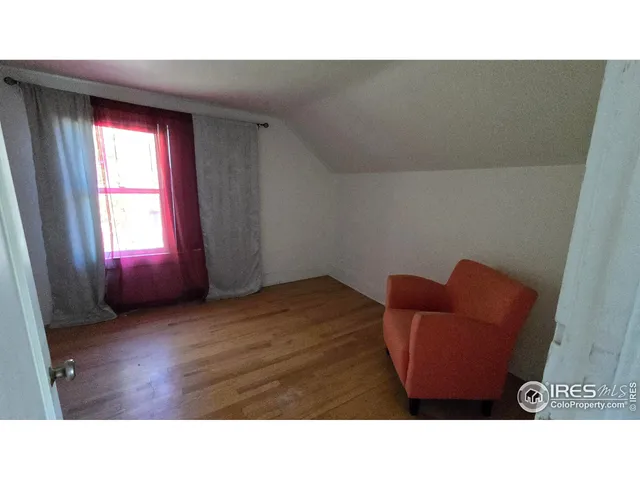 a kitchen with a sink and refrigerator