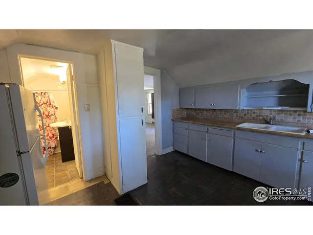 a black and white photo of a house