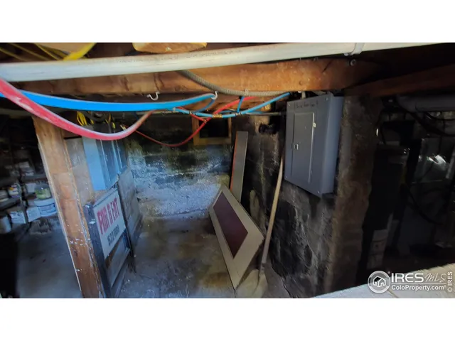 a utility room with a sink and washing machine