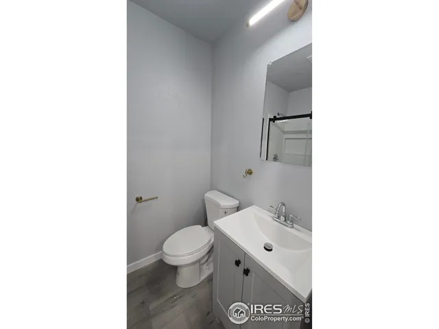 a bathroom with a sink and a shower