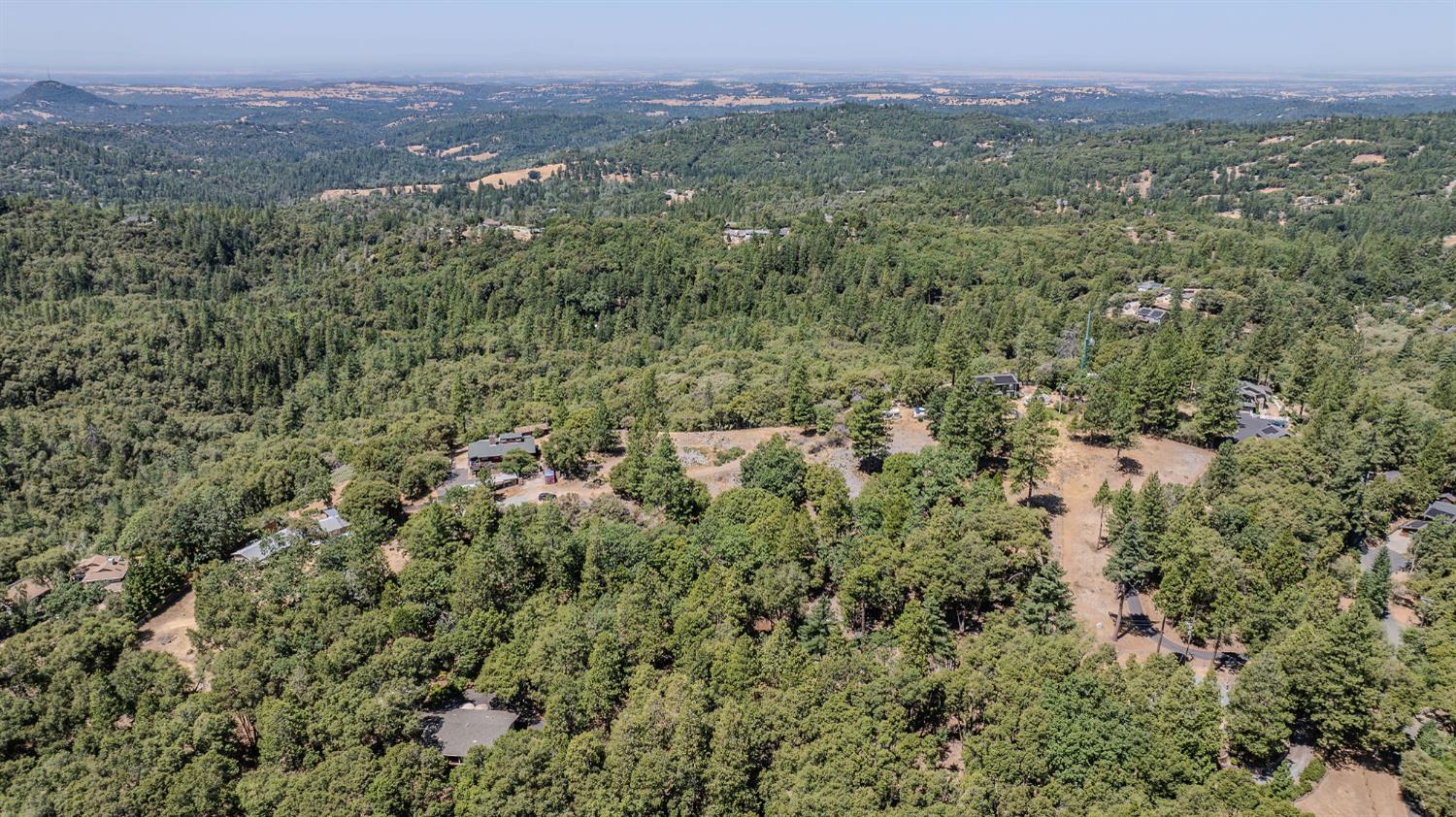 20117 Neilson Road Pine Grove, CA 95665 - Photo 26 of 32 a view of a city with lush green forest
