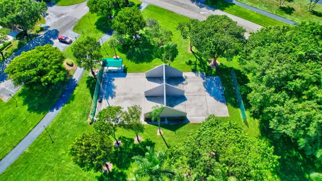 a house with palm tree in front of it