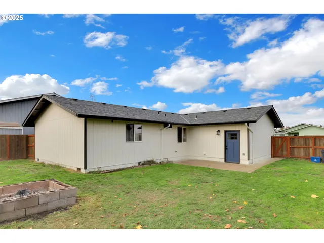 a backyard of a house with lots of green space