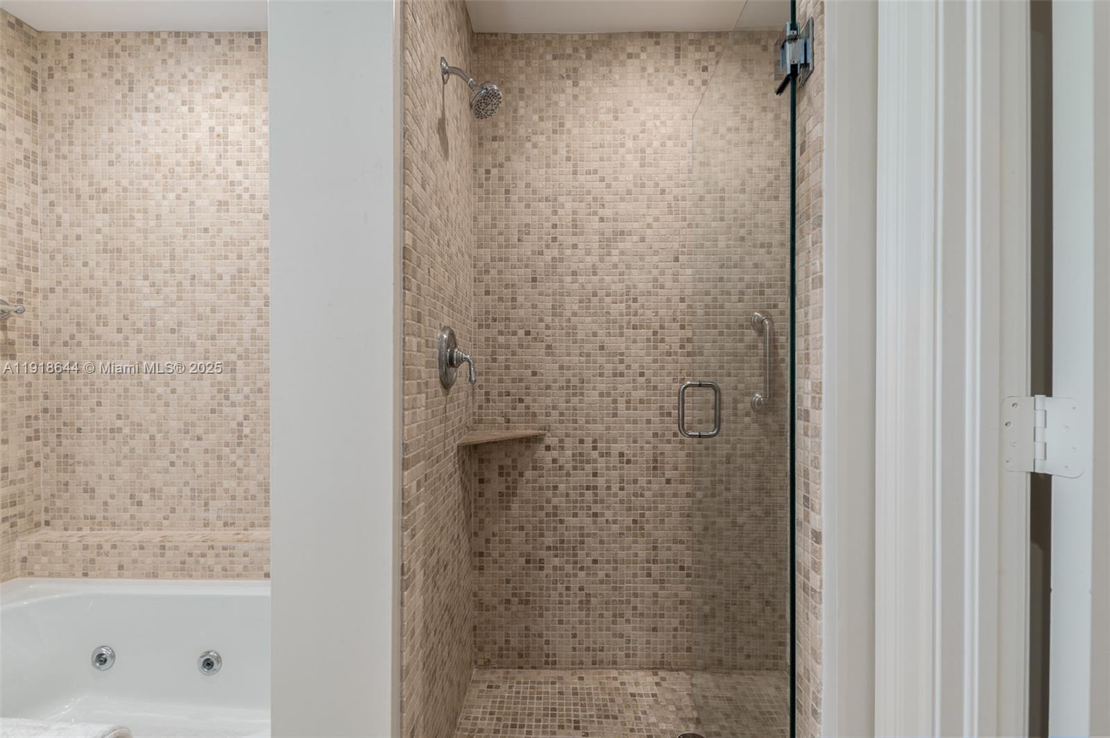 11609 Southeast Florida Avenue Hobe Sound, FL 33455 - Photo 24 of 31 a bathroom with a bathtub