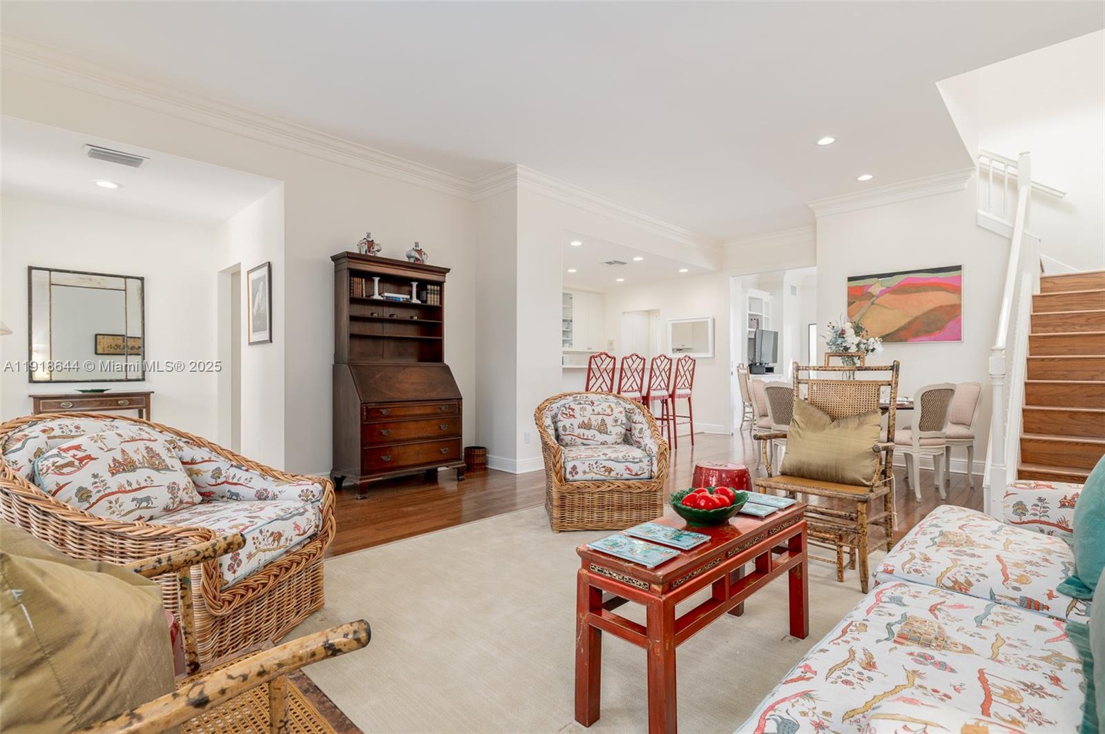11609 Southeast Florida Avenue Hobe Sound, FL 33455 - Photo 10 of 31 a living room with furniture and a dresser