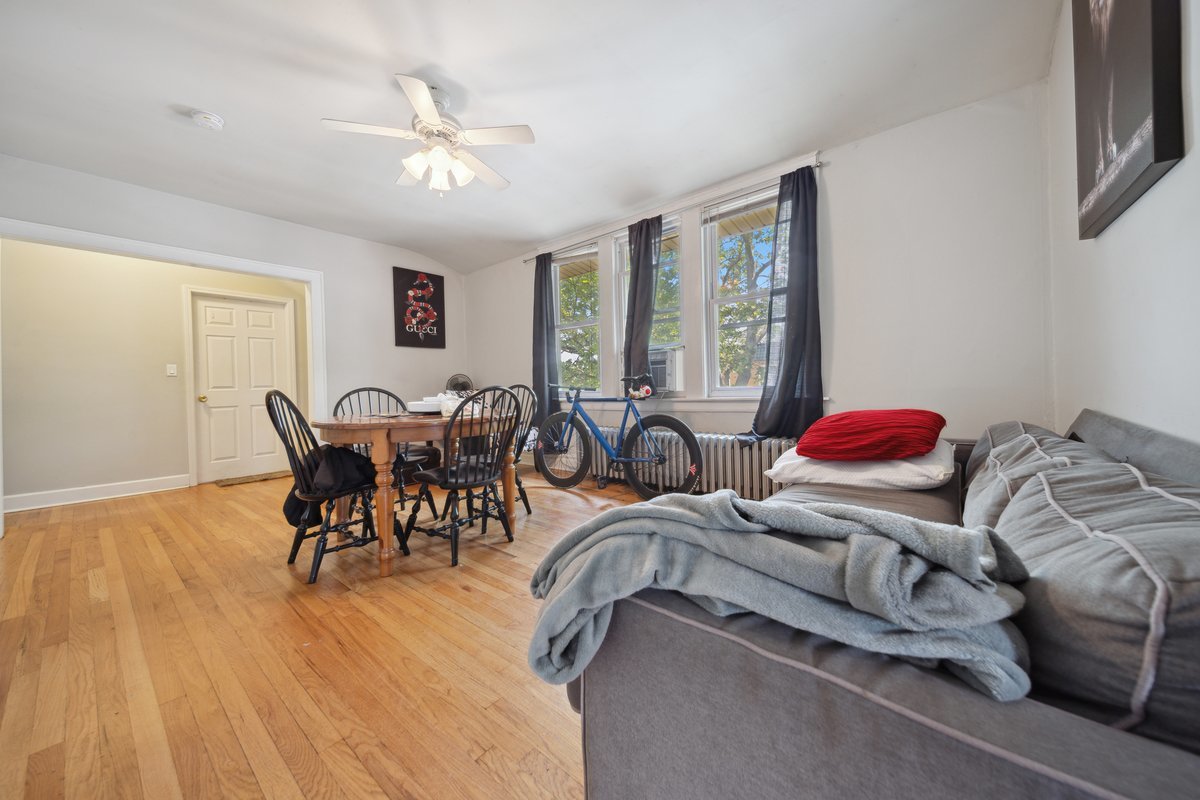 4703 West Parker Avenue Chicago, IL 60639 - Photo 12 of 27 a living room with furniture and a large window