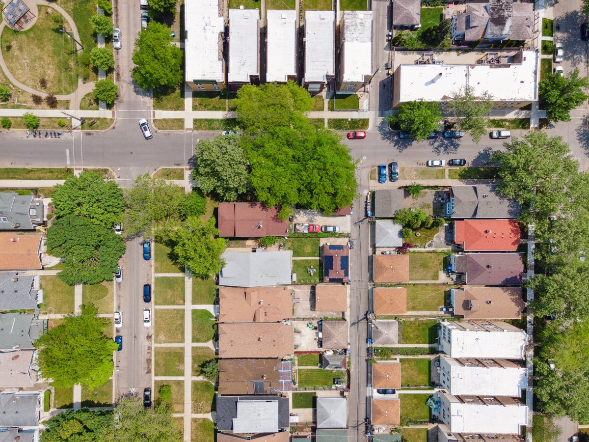 4703 West Parker Avenue Chicago, IL 60639 - Photo 27 of 27 an aerial view of houses with outdoor space