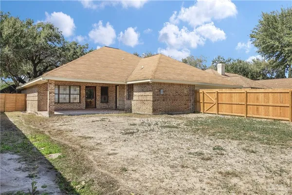 a house with trees in front of it