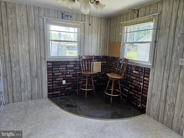 a view of a livingroom with furniture