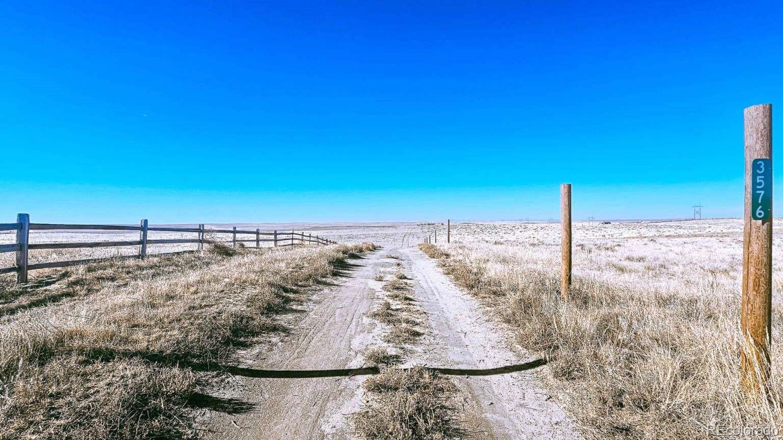 3900 County Road L Wiggins, CO 80654 - Photo 28 of 35 a view of a wooden floor with a yard